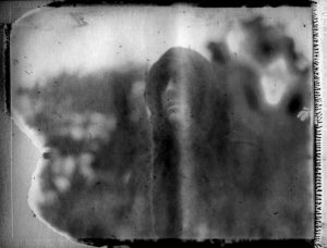 a dark figure of death - corona art - fine art polaroid photography by Guðmundur Óli Pálmason - kuggur.com